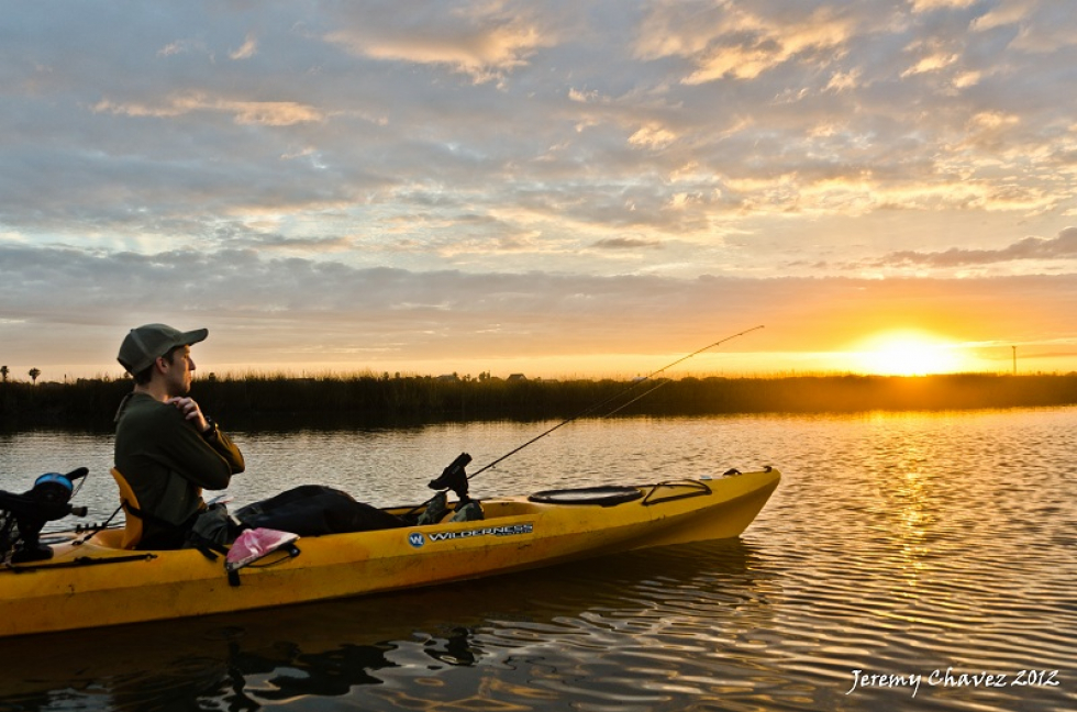 Here’s a shot of a buddy, Judson, I shot last weekend while fishing the marsh. Photo of the Week…Pefect Light