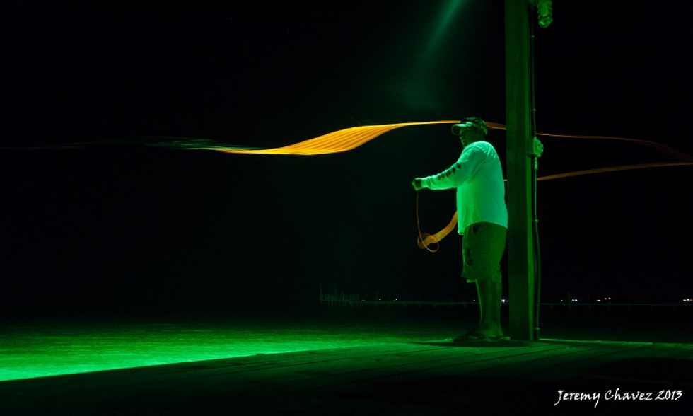Here’s a couple of photos I shot over the weekend while in Rockport. Rob, a buddy, casting his new fly rod off the end of a pier. Photo of the Week…Casting Fire